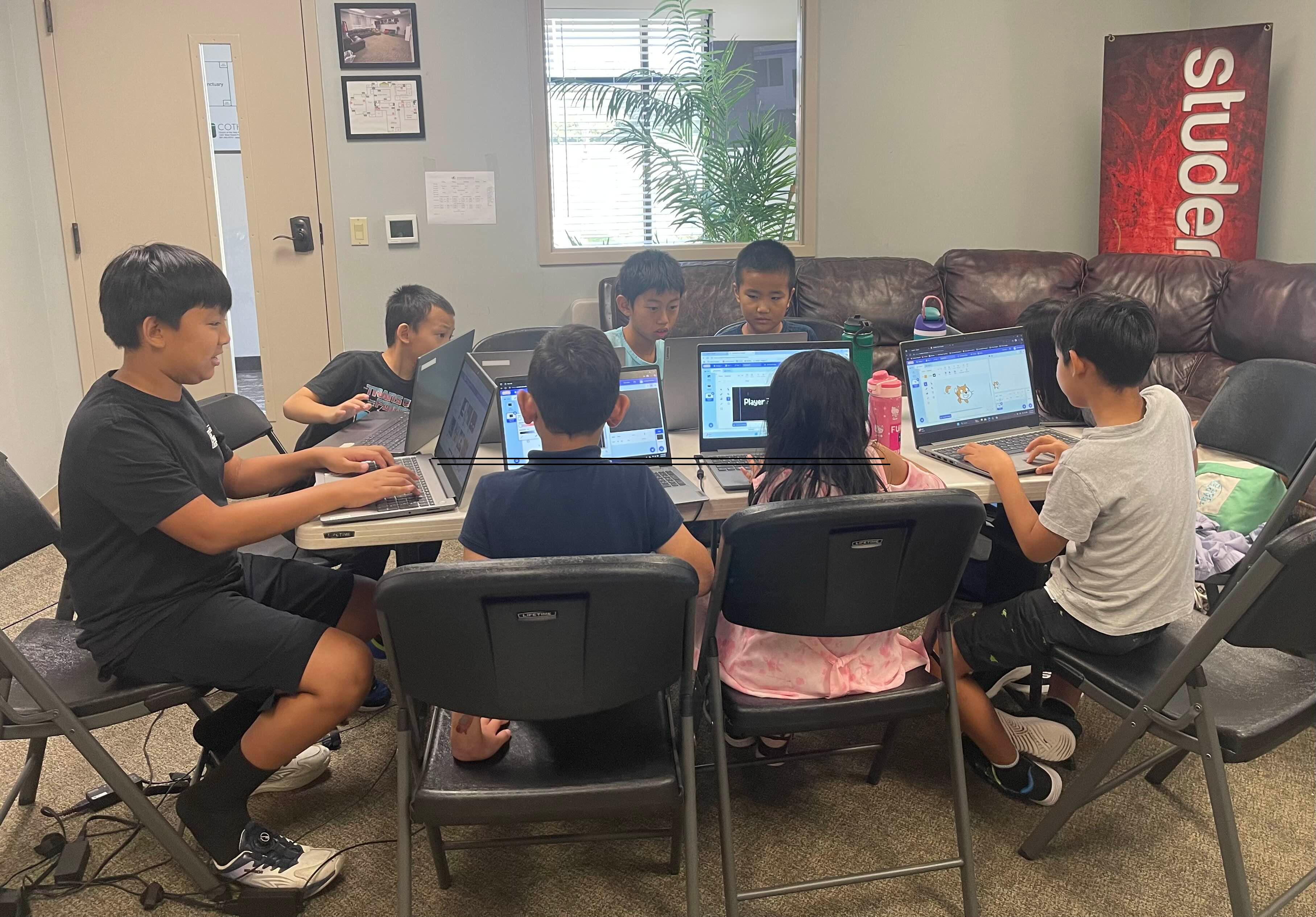 Avarix founders with students